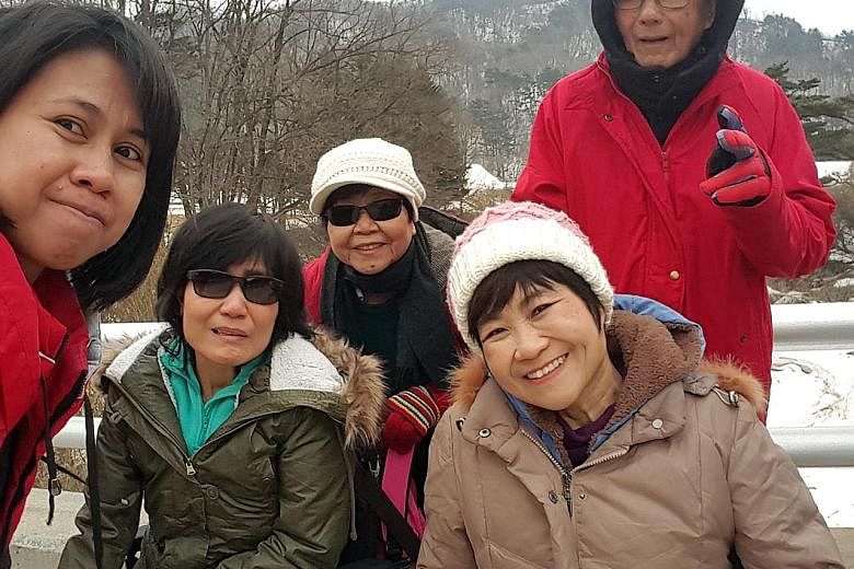 Ms Chia Yong Yong (foreground, wearing cap) with (from left) helper Dewi Muliana, sister Leslie, mother Teo Kee Wei and father Chia Cheng Heng during a trip to South Korea in January.