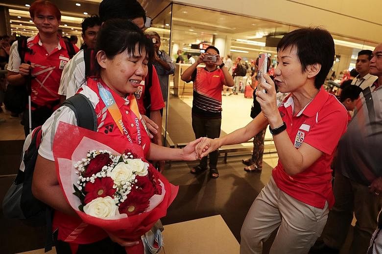 Minister for Culture, Community and Youth Grace Fu welcoming back cyclist Emily Lee and other members of Singapore's contingent returning from the Asian Para Games in Jakarta.