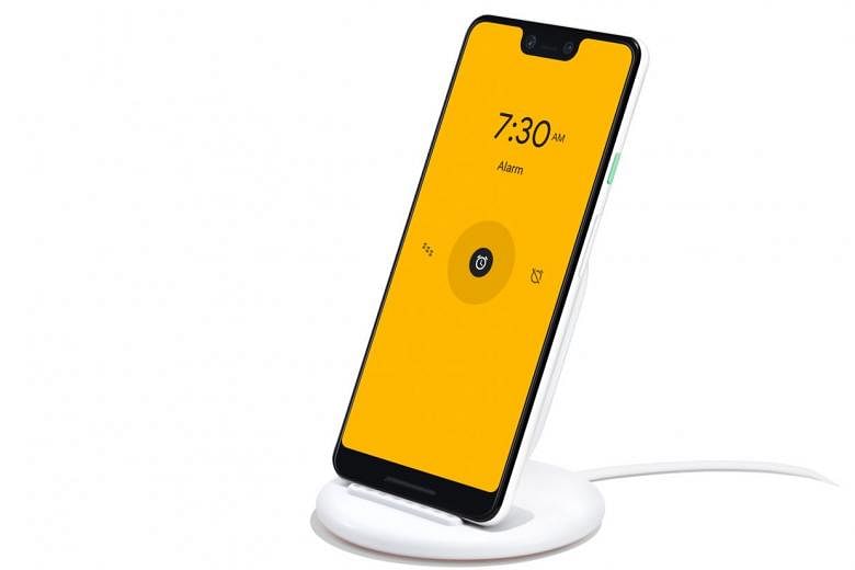 The new Pixel Stand wireless charger turns the Pixel 3 (when docked) into a personalised smart display with quick access to Google Assistant. It will show your photos and also display album art if a music app, like Spotify is playing a song on the phone. 