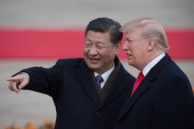 China's President Xi Jinping welcoming US President Donald Trump to the Great Hall of the People in Beijing last year. The two leaders will "probably" meet at a Group of 20 summit in Buenos Aires next month, a US official said, as both sides deplored