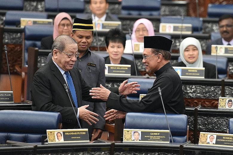 Malaysia's Deputy Prime Minister Wan Azizah Wan Ismail and Prime Minister Mahathir Mohamad in Parliament yesterday. First up on PH's agenda is Thursday's midterm review of the 11th Malaysia Plan, a five-year economic blueprint. Datuk Seri Anwar Ibrah
