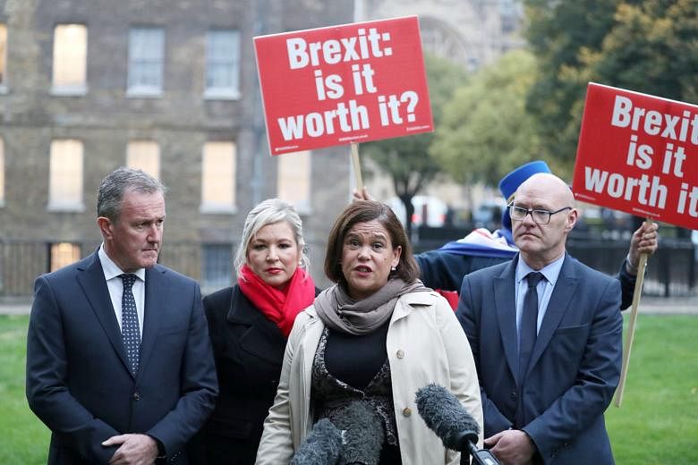 Northern Ireland's Sinn Fein leader Mary Lou McDonald speaking to journalists on Monday before a meeting with Britain's Prime Minister Theresa May in London as talks on a Brexit deal with the EU remain deadlocked.