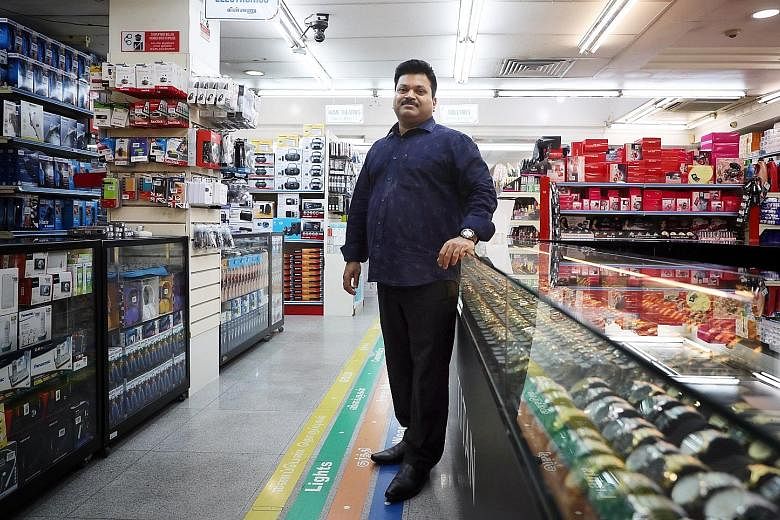 Chief executive C. Sankaranathan at the Appollo Sellappas department store in Little India. Sales at the store have been 30 per cent lower in the past two months compared with the same period last year, as customers prefer to remit money earned here 