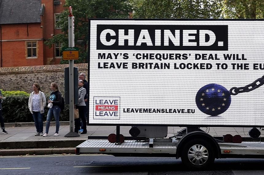 An anti-European Union, pro-Brexit mobile billboard, criticising British Prime Minister Theresa May's controversial "Chequers" deal on a softer Brexit, being driven around the streets of London on Tuesday.
