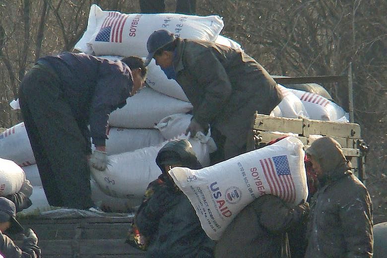 Workers unloading food aid in the Sinuiju region of North Korea in2008. The latest moves by the Trump administration seek to tighten sanctions as part of its maximum-pressure campaign during nuclear negotiations.
