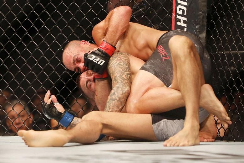 Eddie Alvarez (top) last fought in July against fellow American Dustin Poirier during UFC Fight Night at Scotiabank Saddledome. He lost via TKO but has since signed with One Championship this week and is looking forward to his debut.