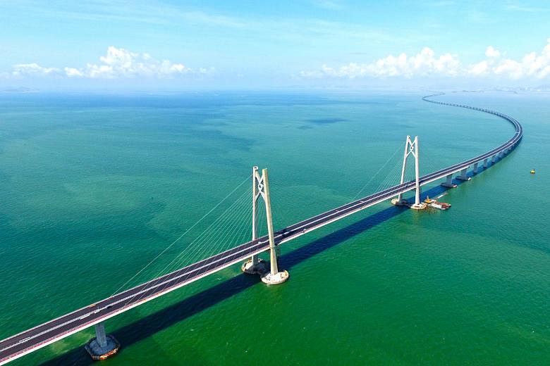 The 55km bridge seen in a picture taken last year. Construction started in 2009 on the crossing, which links Hong Kong's Lantau Island to the southern mainland Chinese city of Zhuhai and the gambling enclave of Macau, across the waters of the Pearl R