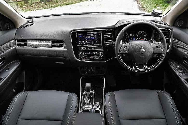 The Mitsubishi Outlander is equipped with cruise control, paddle shift, electronic parking brake with auto hold, 18-inch wheels and motorised tailgate.