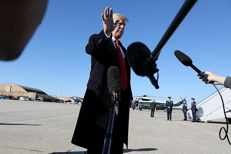 US President Donald Trump waving off further questions after talking to reporters on Thursday about journalist Jamal Khashoggi's disappearance.