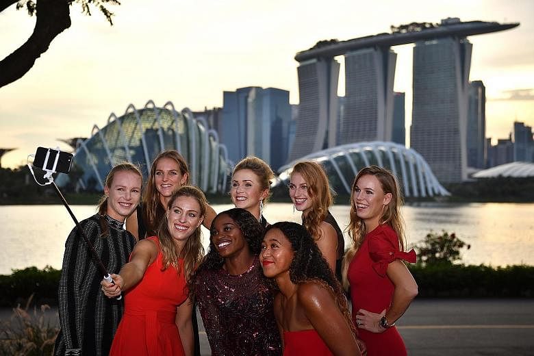 The top eight players here for the WTA Finals taking a wefie yesterday decked out in their finest: (Front row, from left) Kiki Bertens, Angelique Kerber, Sloane Stephens, Naomi Osaka. (Back row, from left) Karolina Pliskova, Elina Svitolina, Petra Kv