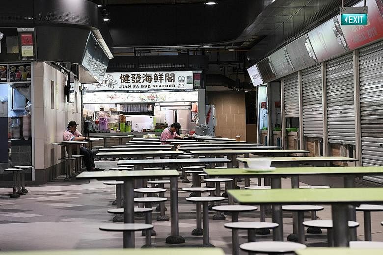 2.50amHawker centre workers resting in the quiet night. There are now 16 stalls open 24 hours a day out of 42, down from 36 in 2016. 2am Hawker Alex Hoong serving junior college student Tan Yun Wee a bowl of Korean ramen noodles. Mr Hoong's Korean fo