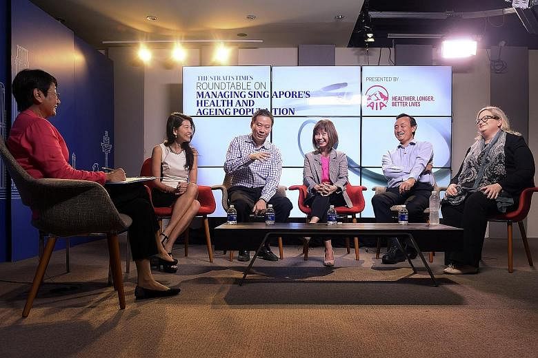 The roundtable sponsored by AIA and held at the SPH Digital Studio was moderated by journalist Salma Khalik (left). The panellists were (from left) Ms Melita Teo, Dr Jeremy Lim, Dr Amy Khor, Professor Chia Kee Seng and Ms Sigal Atzmon.