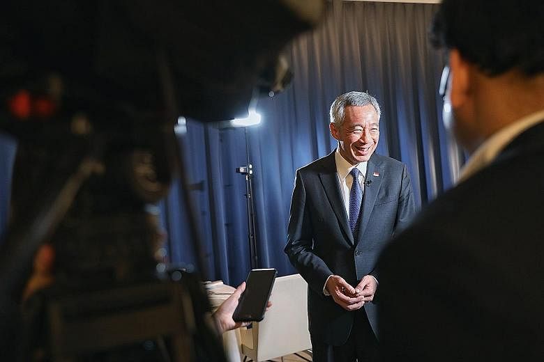 Prime Minister Lee Hsien Loong notes that the old system of multilateralism is showing its strains and limitations. Prime Minister Lee Hsien Loong with other leaders at last Friday's Asia-Europe Meeting Summit in Brussels. The summit involving 30 Eur
