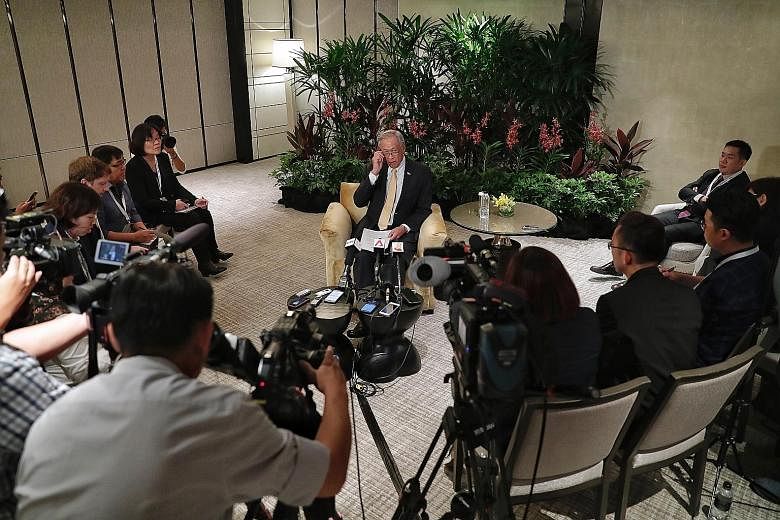 Defence Minister Ng Eng Hen speaking to the media after the ADMM-Plus on Saturday at Shangri-La Hotel. He acknowledged that even getting the 10 Asean nations on board for the multilateral air code was not a given.
