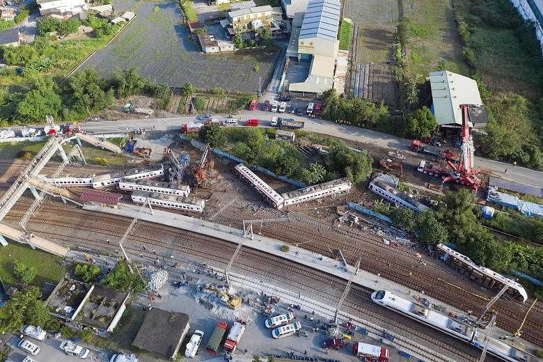 An aerial view of the Puyuma Express train, which was carrying 366 people. All eight of the train's cars derailed.