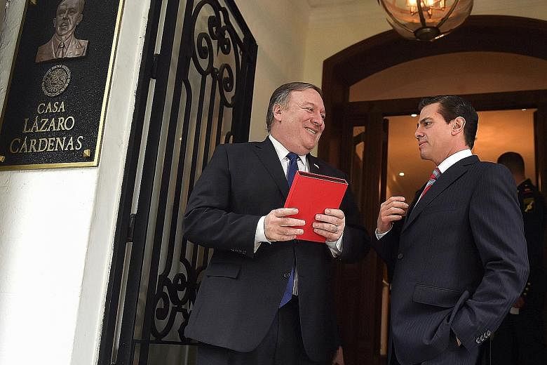 US Secretary of State Mike Pompeo (left) meeting Mexican President Enrique Pena Nieto at the Los Pinos presidential residence in Mexico City last Friday. Mr Pompeo was on a Latin America tour at the end of last week, and told reporters that "when Chi