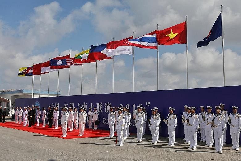 Contingents from the participating nations forming up for the opening ceremony of the Asean-China Maritime Field Training Exercise.