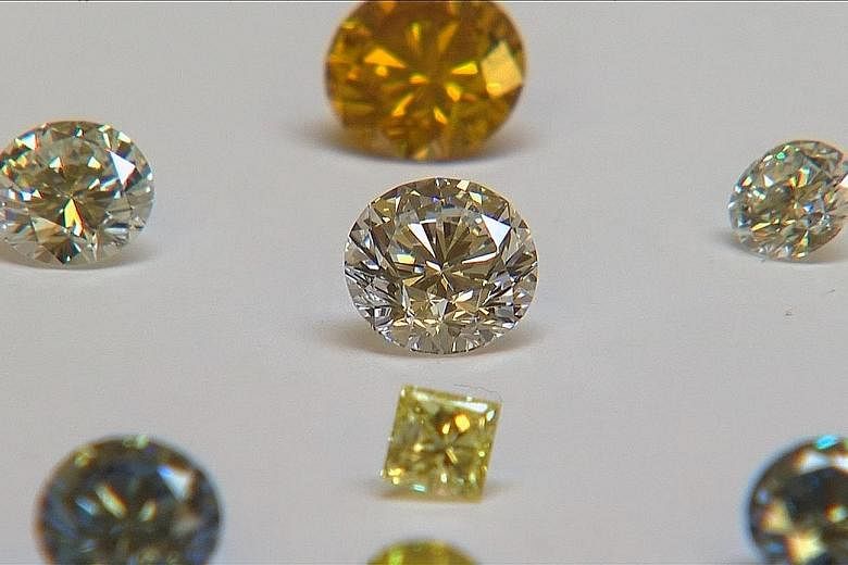 A video still showing synthetic diamonds that are on display at De Beers' International Institute of Diamond Grading and Research in Maidenhead.