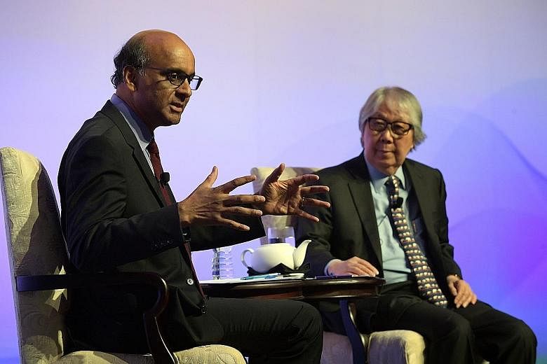 Deputy Prime Minister Tharman Shanmugaratnam at a dialogue last night moderated by Ambassador-at-large Tommy Koh at the Institute of Policy Studies' 30th anniversary dinner.