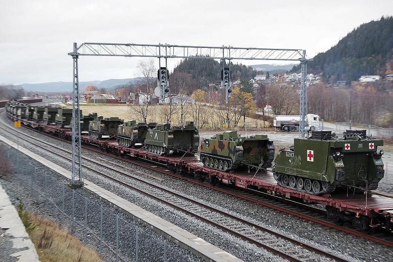 Military vehicles being deployed by train during Trident Juncture 18, which is aimed at training the Atlantic Alliance to defend a member state after an aggression.