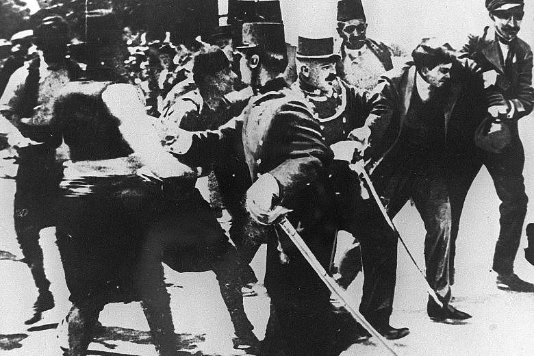 A June 28, 1914, photo showing the Bosnian Serb Gavrilo Princip being arrested after the assassination of Archduke Franz Ferdinand of Austria and his wife in Sarajevo - which led to World War I.