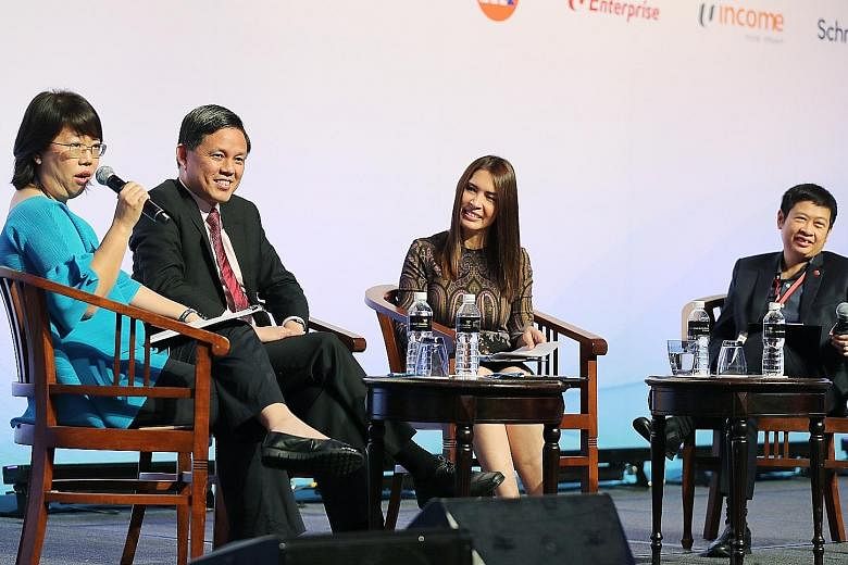 Minister for Trade and Industry Chan Chun Sing at yesterday's panel discussion on income inequality and social mobility with (from left) The Straits Times' Opinion editor Chua Mui Hoong, Channel NewsAsia's senior producer and presenter for internatio