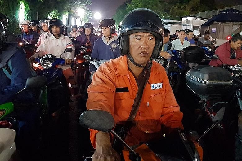 Malaysian Yap Boon Hock, 50, wakes up at 4.30am to ride from his rented home in Johor Baru to Pasir Panjang in Singapore, where he works as a welder. This has been his daily routine for the last 20 years and he is used to jams, long delays and having