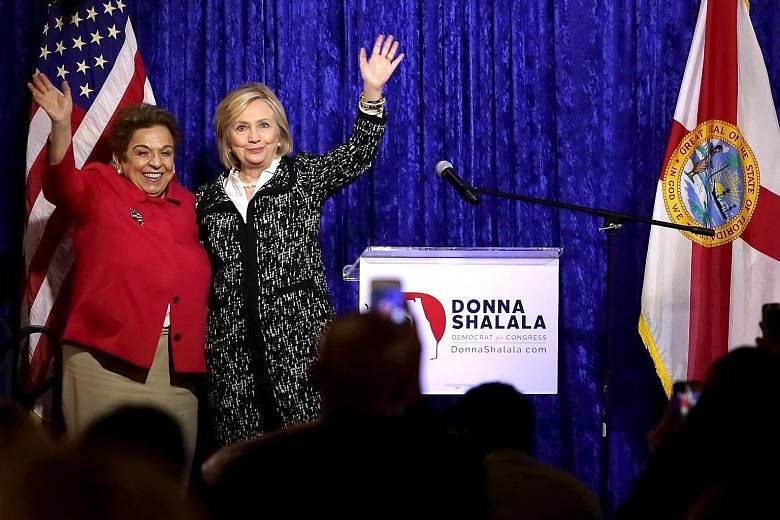 Democratic Party politician Donna Shalala (left) with former secretary of state Hillary Clinton at a lunch reception held as part of Ms Shalala's congressional campaign in Miami last Wednesday. Ms Shalala has described the Nov 6 midterm elections, se