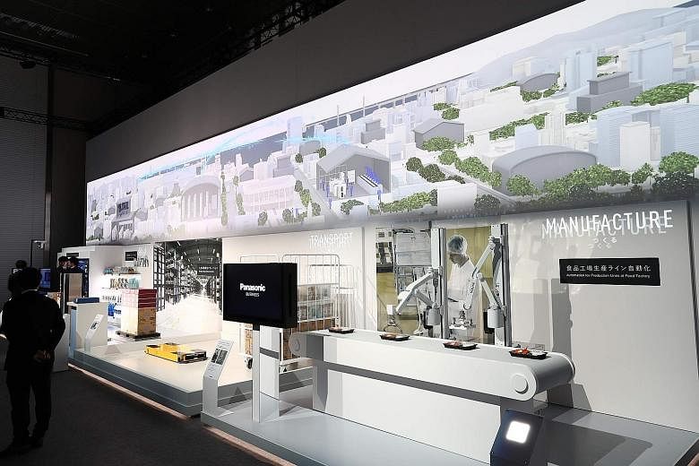 Exhibits at Panasonic's Cross-Value Innovation Forum which opened in Tokyo yesterday. The company, which marks its 100th anniversary this year, aims to make bigger inroads into China, among other plans.