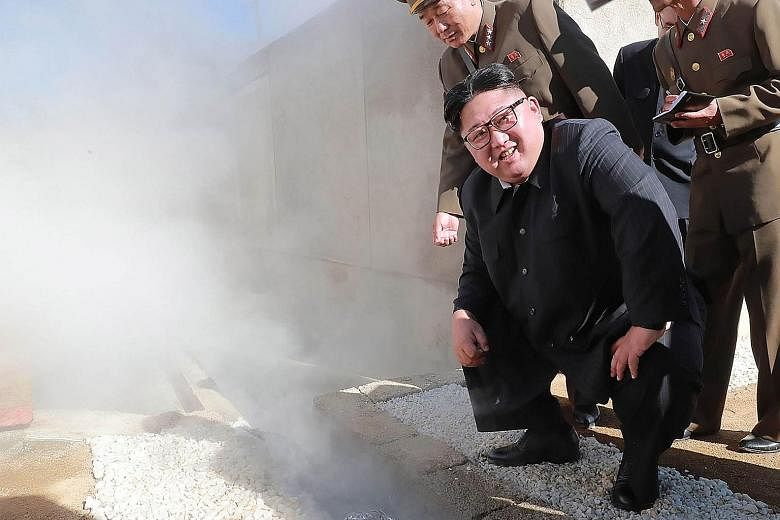 North Korean leader Kim Jong Un inspecting the construction site of a hot spring tourist area in Yangdok county, South Phyongan province, yesterday.