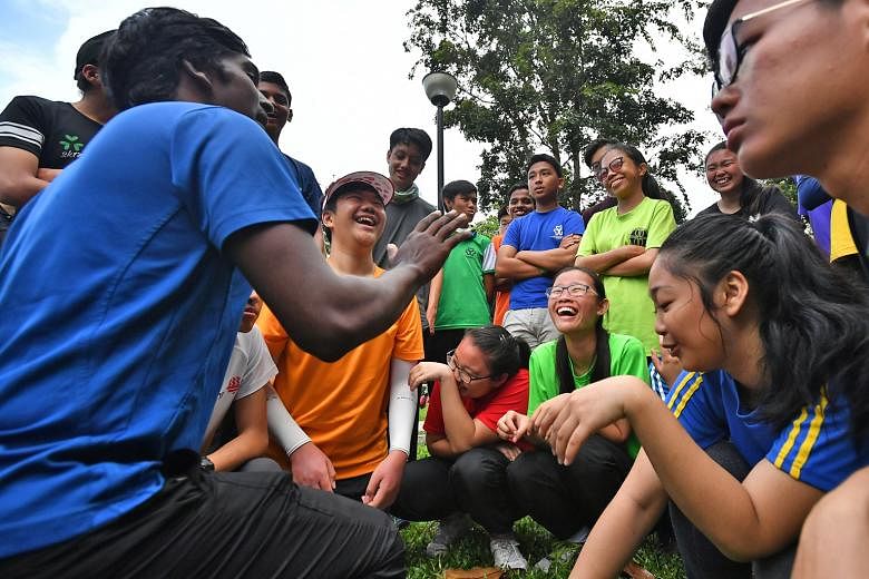 Students attending a briefing session at the OBS Changi Campsite yesterday before setting off for an expedition along heritage trails. They are taking part in a five-day camp co-designed by the Ministry of Education and Outward Bound Singapore. After