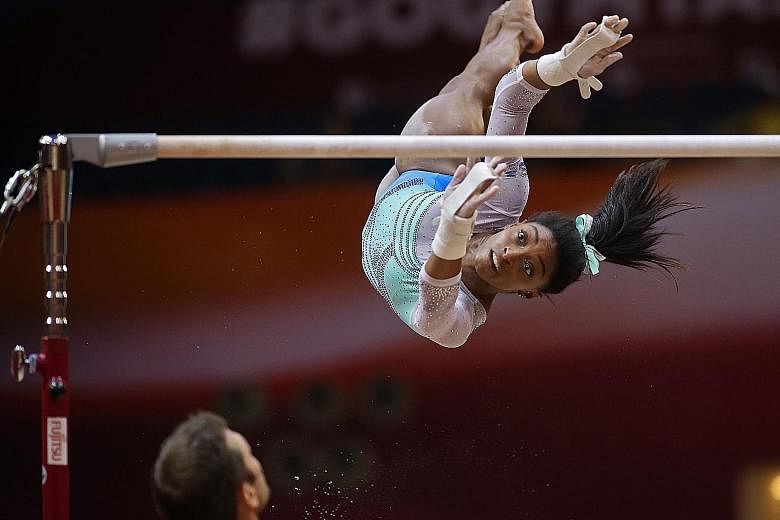 Despite falls on the balance beam and vault, Simone Biles proved too good as she won the all-around title at the World Gymnastics Championships in Doha on Thursday.