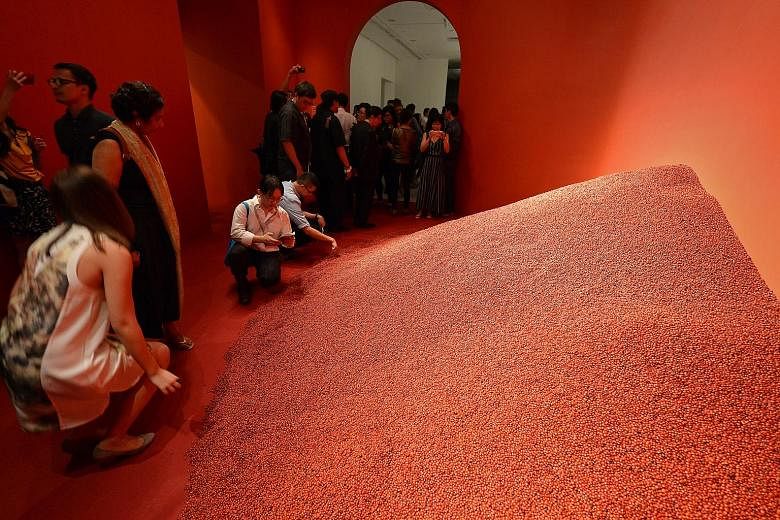 Anahata, on display at Singapore Biennale 2013, is by artist Kumari Nahappan and consists of 4,000kg of saga seeds collected across South-east Asia.