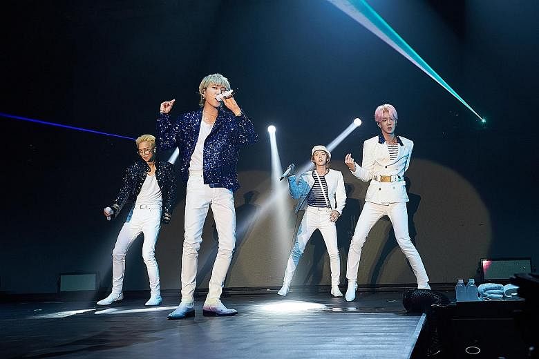 K-pop boyband Winner members (from far left) Mino, Yoon, Jinu and Hoony performing at The Max Pavilion last Saturday.