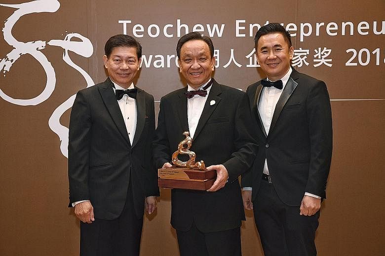 From left: Mr Ronald Lee, managing director of PrimeStaff Management Services; Mr Irman, president and CEO of Indonesia's Dima group; and Mr Stanley Yeo, founder of ZACD Group at the Asean Teochew Entrepreneur Award event. It is given out by the Teoc