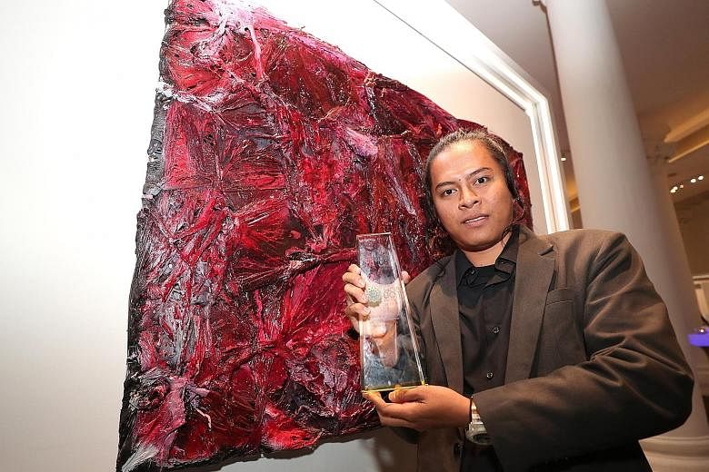 Indonesian artist Suvi Wahyudianto, 26, is the youngest artist to win the UOB Southeast Asian Painting of the Year award.