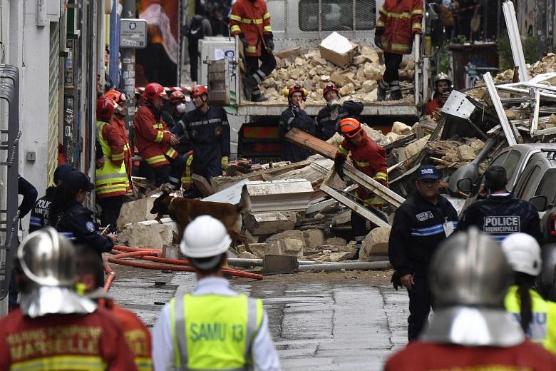 Rescuers search for victims after buildings collapse in Marseille | The ...