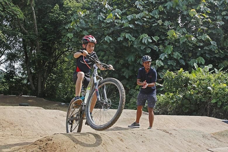 Some 50 children experienced off-road riding at a clinic to mark the Singapore Cycling Federation's launch of its youth development academy at Turf City's Centaurs Sports Park yesterday.