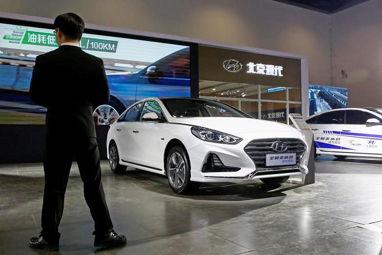 A Sonata hybrid on display at a vehicles expo in Beijing recently. Hyundai Motor says it is closely cooperating with China's BAIC Motor to turn around its China business.
