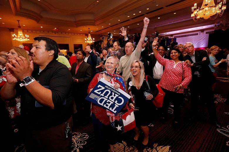Supporters cheering during an election night party in Houston for Republican Senator Ted Cruz, who retains his seat in Texas.