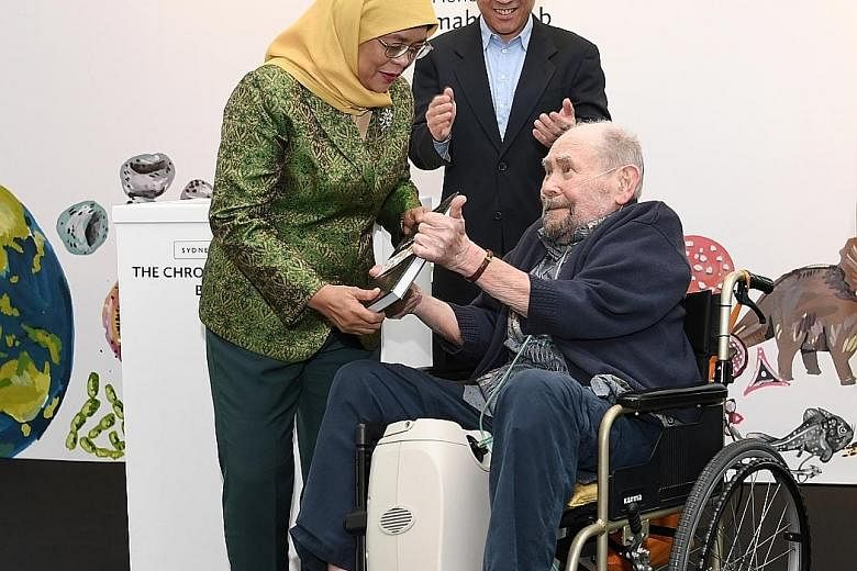 President Halimah Yacob and A*Star chairman Lim Chuan Poh at the book launch of Sydney Brenner's 10-On-10: The Chronicles Of Evolution, the brainchild of Nobel laureate Sydney Brenner.