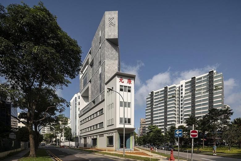 An eight-storey extension has been added to the Khong Guan Building.