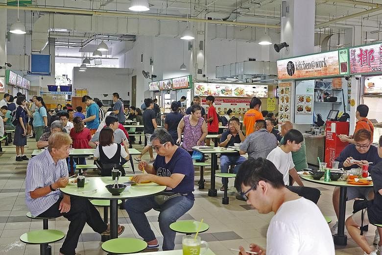 Social enterprise hawker centre operators have put in several initiatives to nurture new hawkers. At Fei Siong-run Ci Yuan Hawker Centre (left), new hawkers can rent a hawker stall for six months at half the market rate.