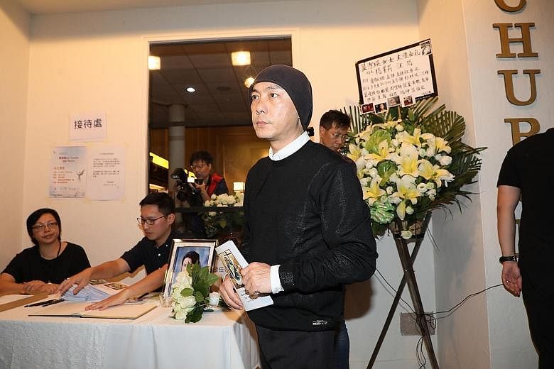 Above: Actor Dicky Cheung turned up to pay his respects and read a verse from the Bible.