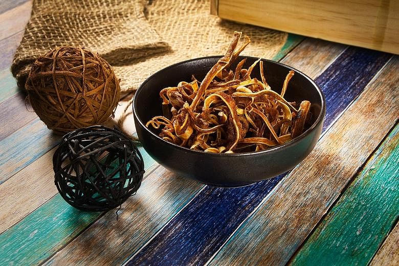 Crispy Pig's Ear is deep-fried to a crisp and the curry powder it is coated with is perfect - not overly spicy or salty.