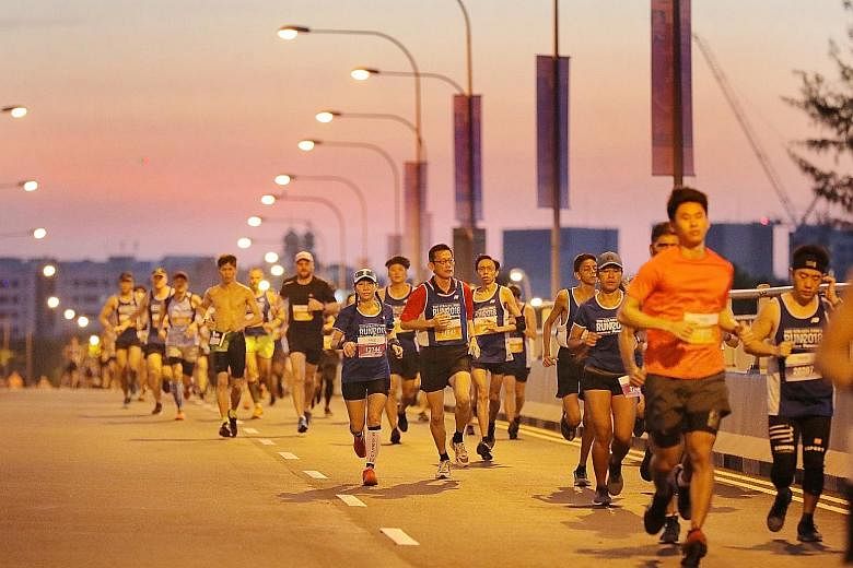 (Above) Runners in the 10km race at the ST Run in September. A new study found that the greater someone's fitness, the less likely he was to have died prematurely and vice versa.