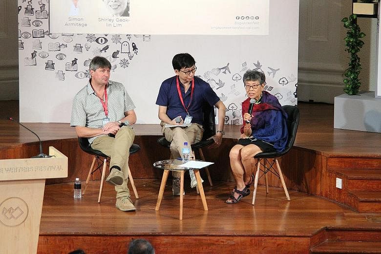 (From far left) British poet Simon Armitage, moderator and writer Gwee Li Sui and Malaysia-born American poet Shirley Geok-lin Lim at the lecture, Across The Universe: Three Poets Address The State Of The World, at the Singapore Writers Festival.
