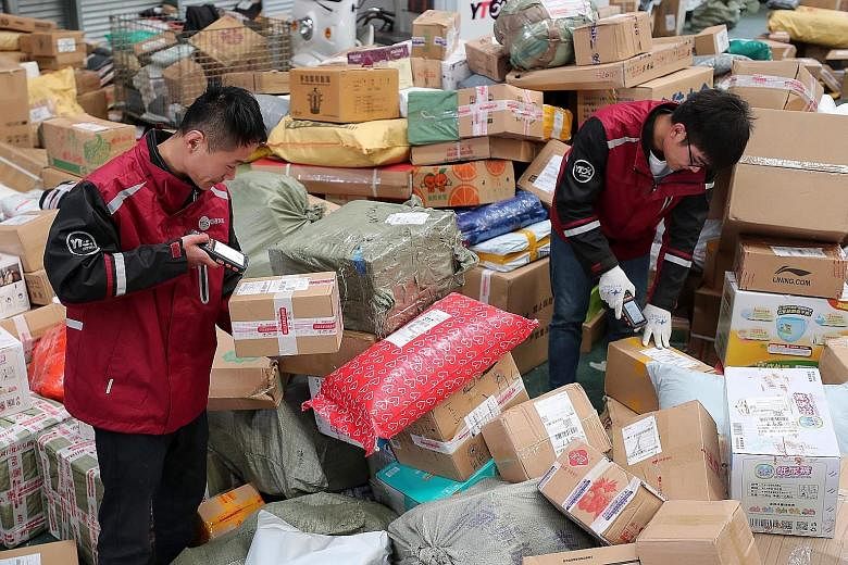 Workers sorting Singles' Day packages for delivery in Lianyungang, in China's north-eastern Jiangsu province.