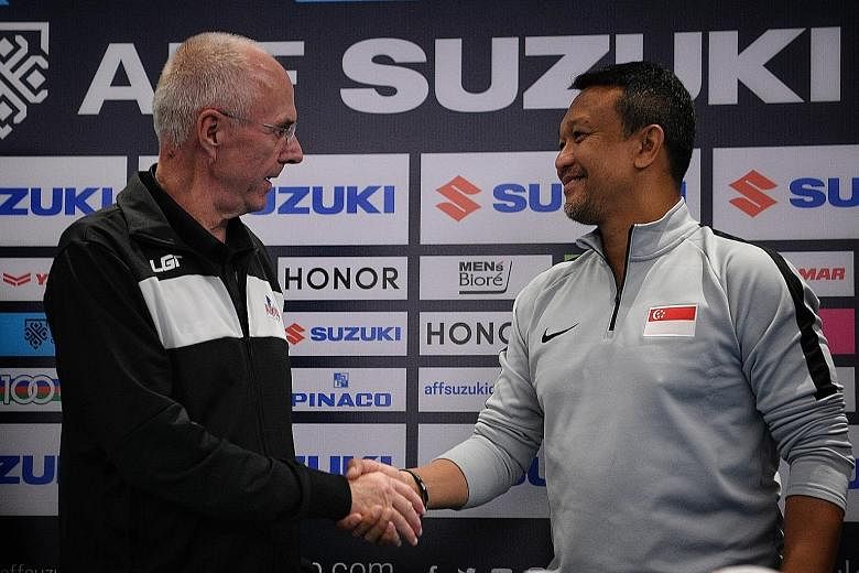 Philippines head coach Sven-Goran Eriksson with Singapore interim coach Fandi Ahmad at yesterday's press conference. The Swede says his team will have to play very well to beat the Lions.