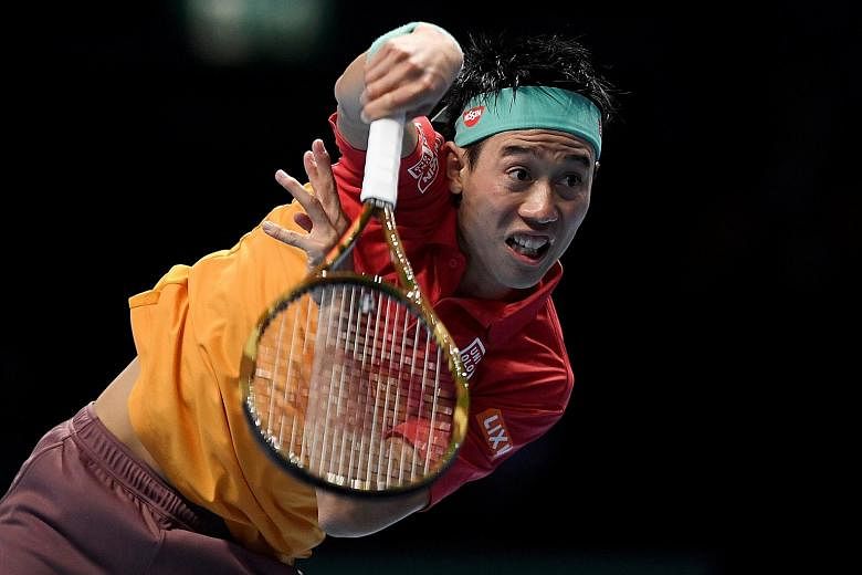 Kei Nishikori battling to a 7-6 (7-4), 6-3 win over Roger Federer in their opening round-robin match at the season-ending ATP Finals on Sunday. It was the Japanese player's first win over the Swiss since 2014, and also Federer's first straight-sets r